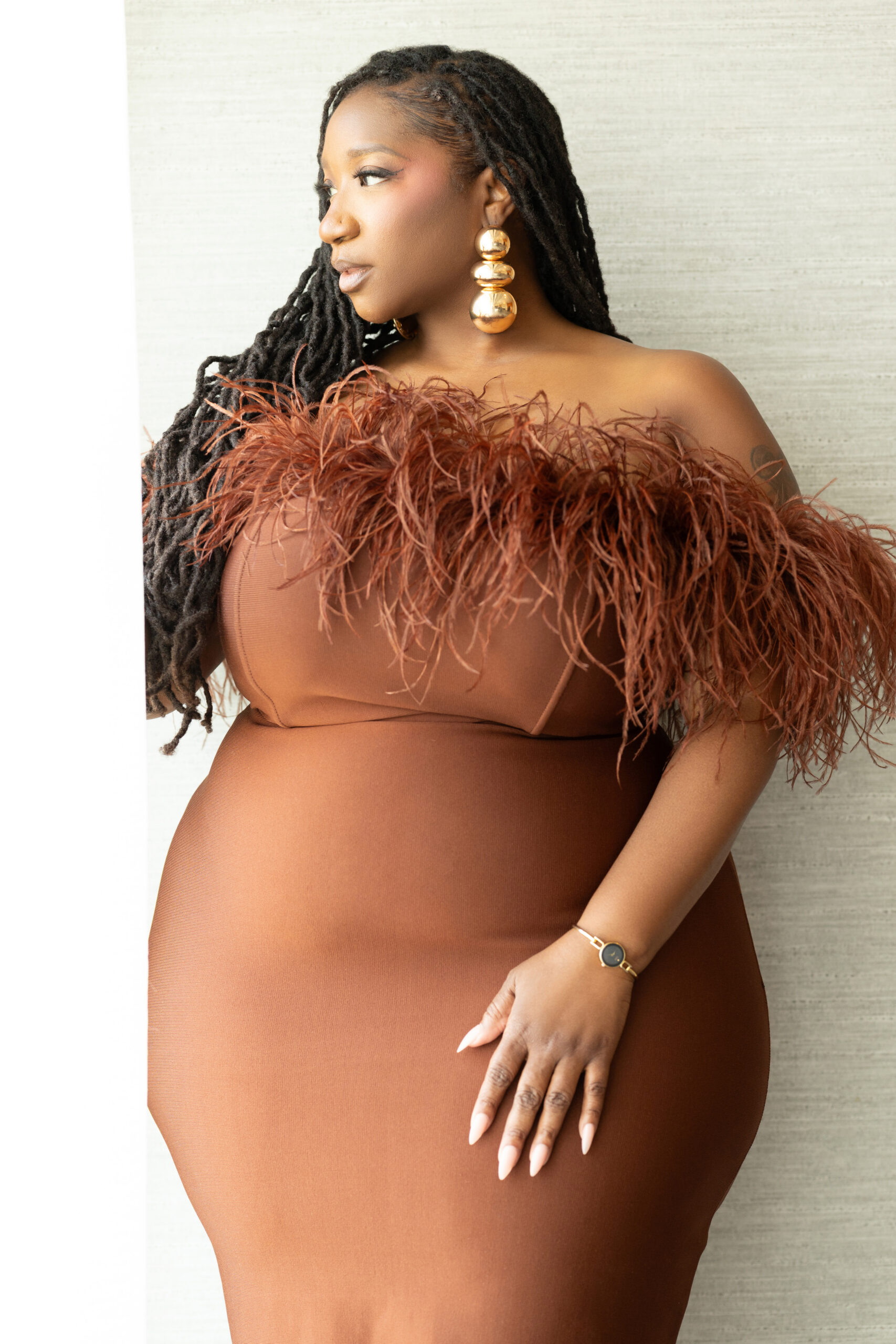 Felicia Reed guiding a photoshoot for women over 40 in her Austin studio