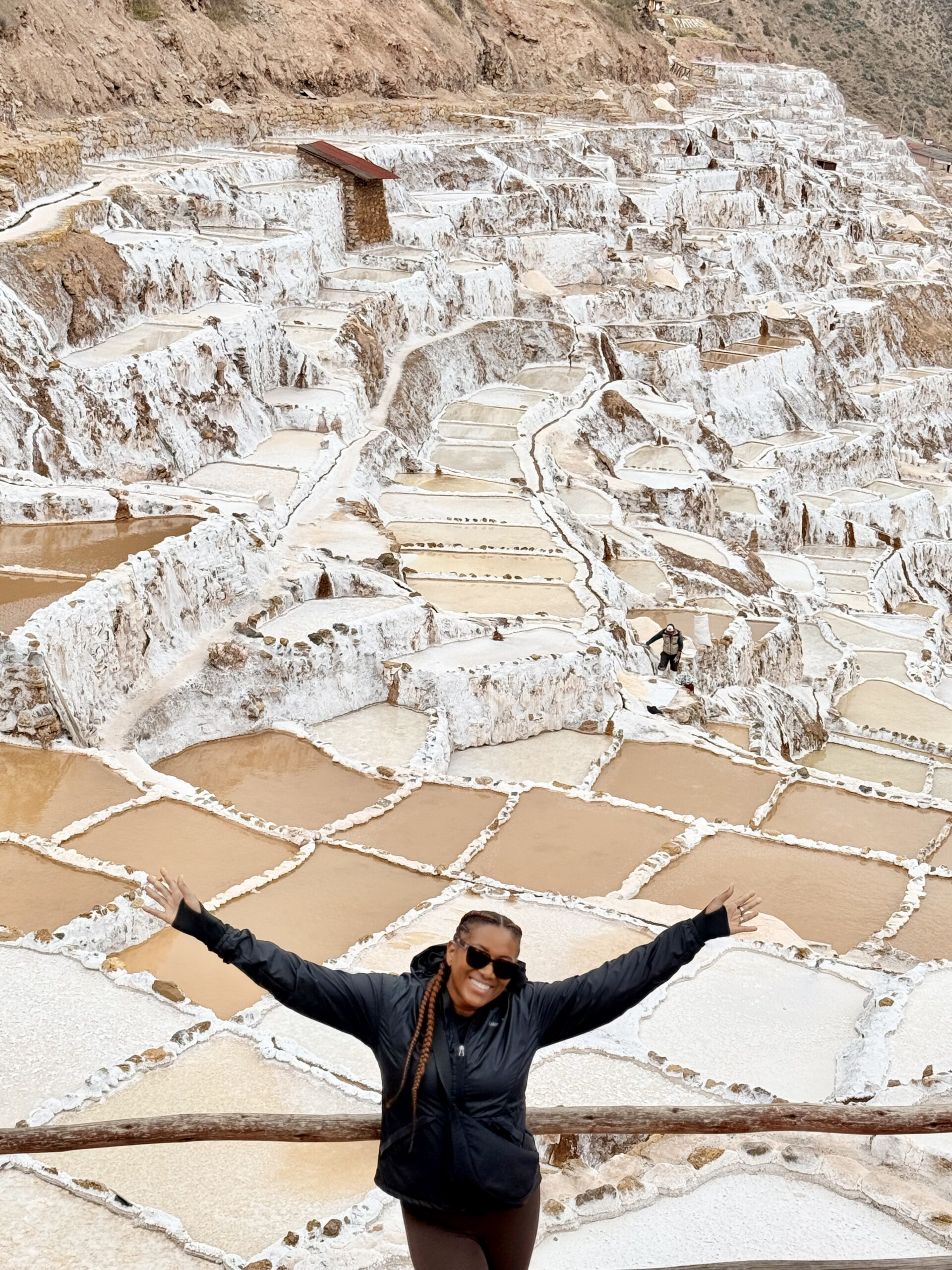Why Traveling to Peru Was One of the Best Investments I’ve Made in Myself | Salt Mines in sacred valey scaled